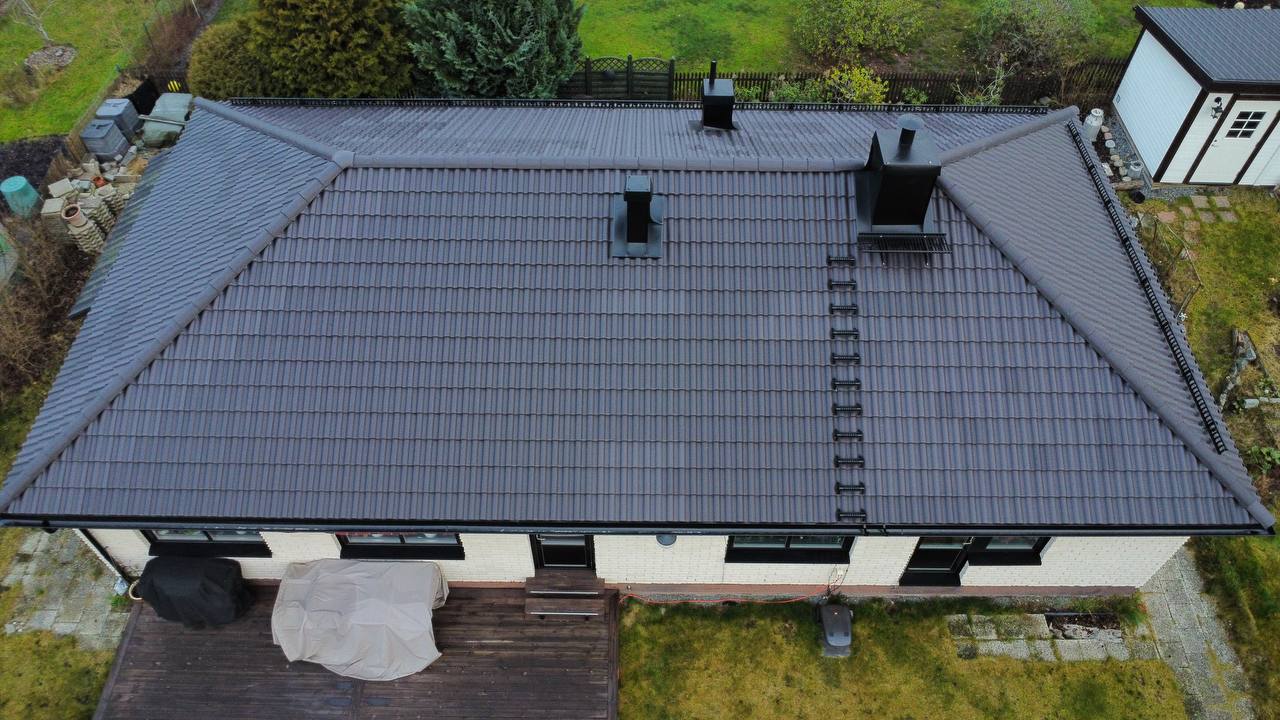 Modern Takomläggning Täby Kyrkby